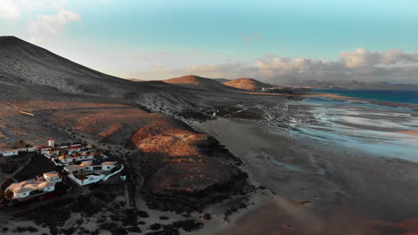 aerial view of the coast line of the sotavento beach at sunset