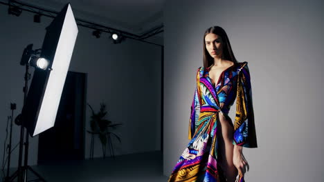 fashionable woman in a colorful printed dress