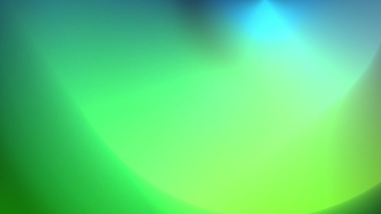 Animation of glowing green gradient abstract out of focus shapes