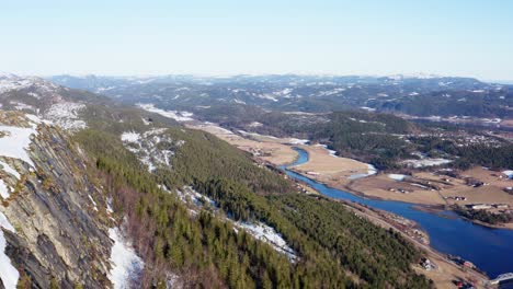 Panoramic-View-Of-Rocky-Forest-Mountains-With-Flowing-River-In-Blaheia,-Lofoten-Islands,-Norway