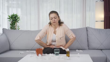 woman experiencing stomachache.