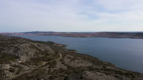 Rocky-Mountain-At-Pag-Island-With-Scenic-View-Of-Adriatic-Sea-In-Croatia