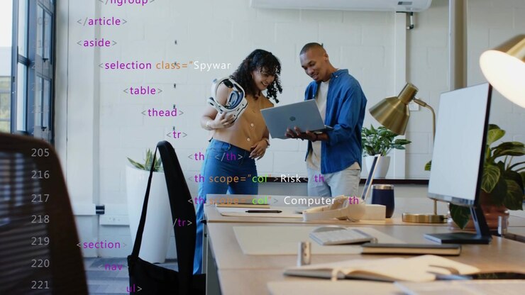 Woman entering lifting VR headset, man tilting laptop, cyber security overlay guiding review