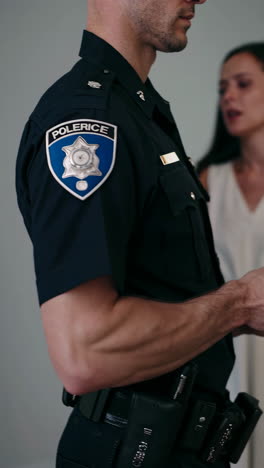 police officer interacting with a woman