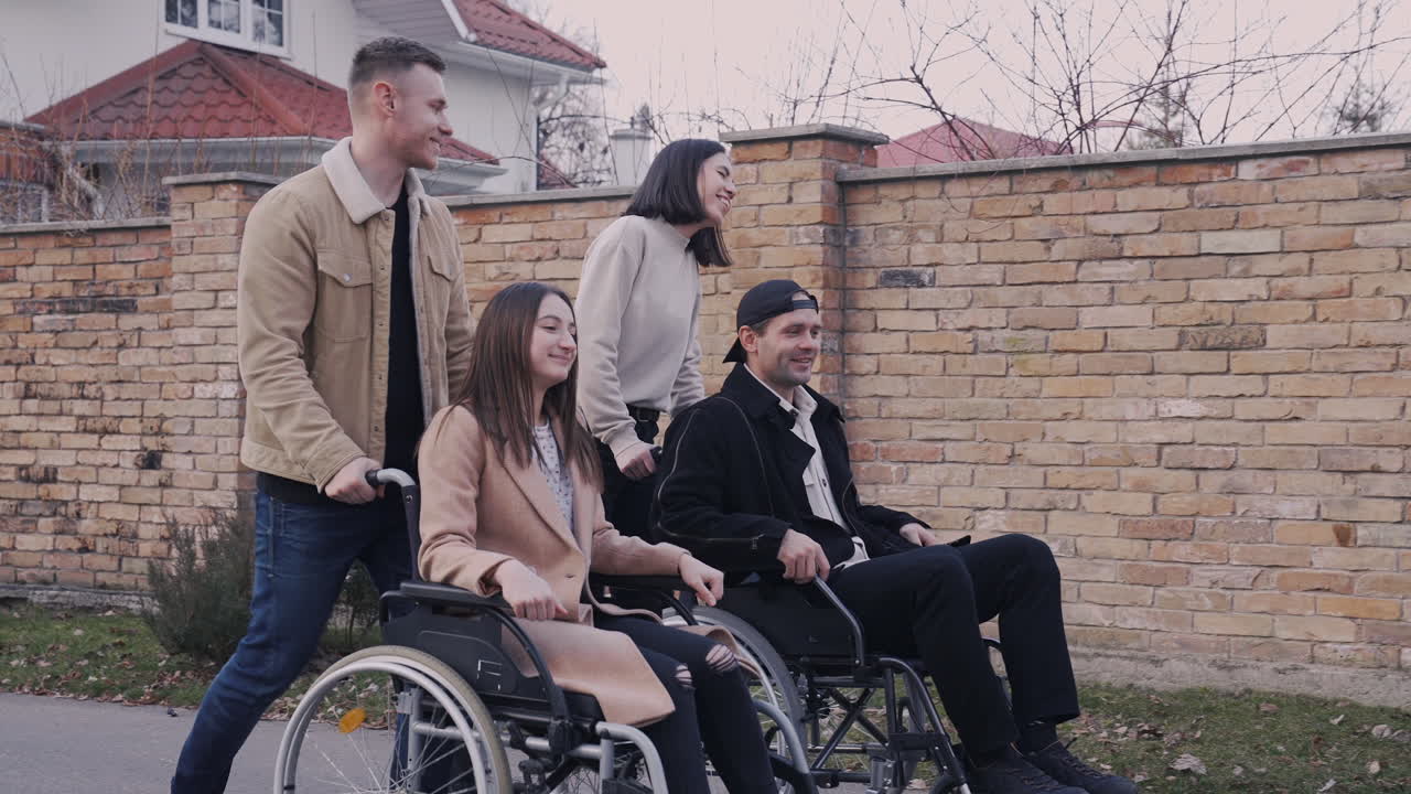 Free stock video - Woman and man taking a walk with her disable friends ...
