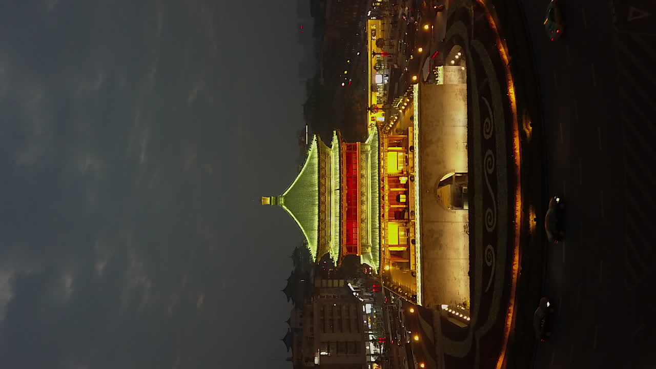 Vertical format: Flight to Xi'an city Bell Tower traffic circle, China