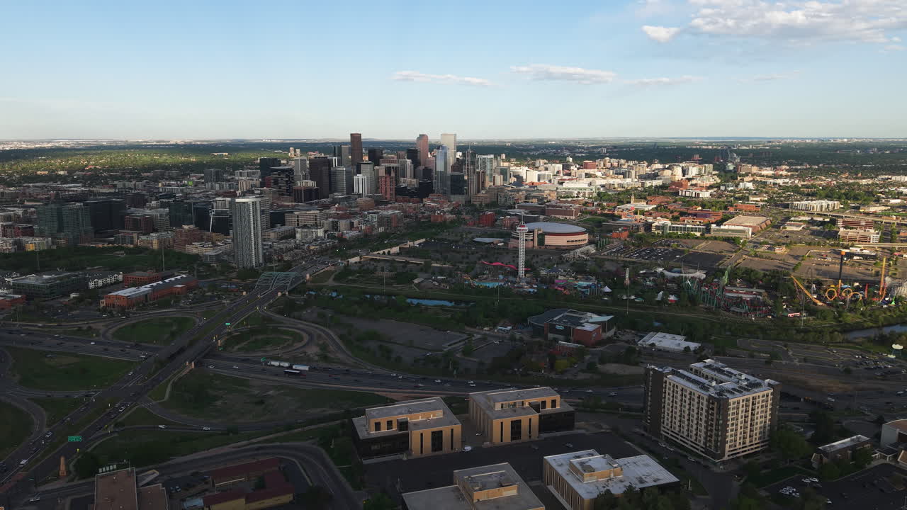 Aerial view over interstate 25, toward the downtown Denver skyline, in sunny USA