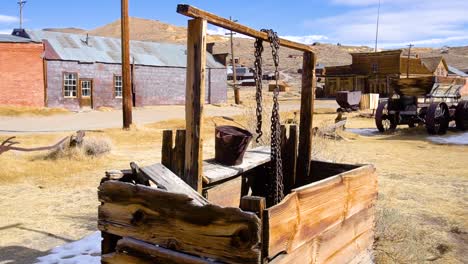 old well in the bodie mine ghost town, panshot