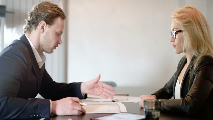 Businesswoman Interviewing Job Applicant 1