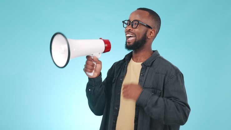 Black man, megaphone and protest