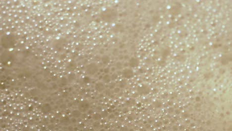 wallpaper of a blanket of white soapy, enveloping bubbles