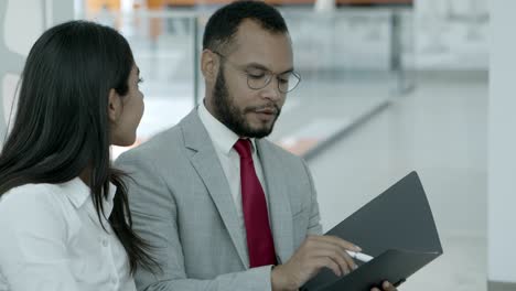 coworkers discussing business project