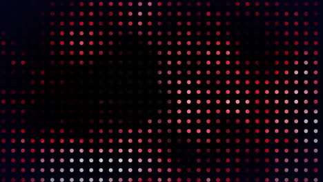 animation of neon glowing light spots pattern moving over black background