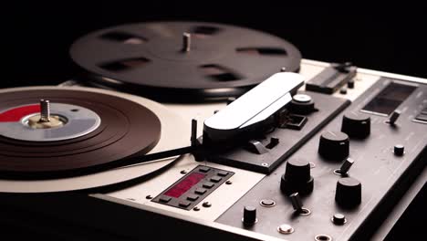 Professional-Magnetophone-and-Spinning-Reel-to-Reel-Audio-Tape,-Playback-or-Recording,-Close-Up