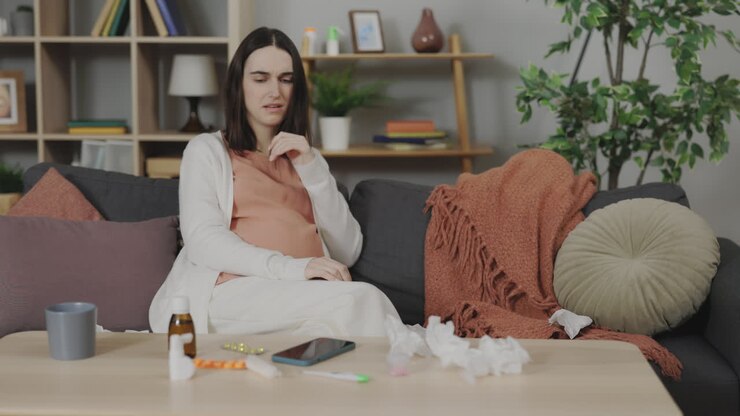 Pregnant Woman Feeling Ill at Home