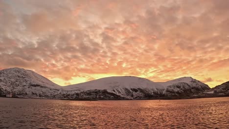 Sunset time-lapse over Rolvsøya island, north Norway