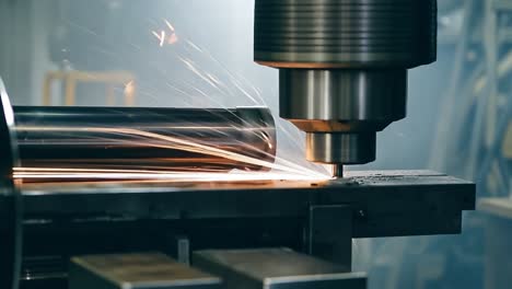 close-up of a cnc machine drilling a metal part