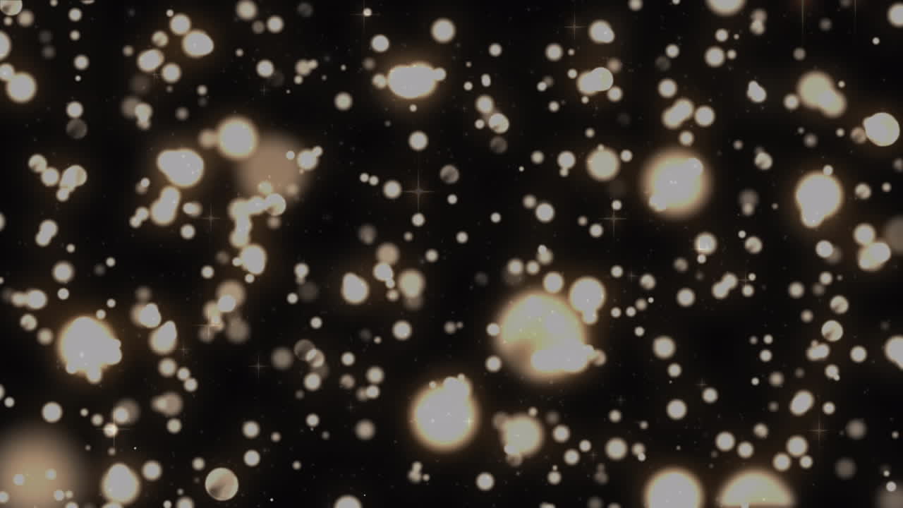 animación de manchas amarillas brillantes sobre un fondo negro