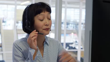 young woman working in a creative office