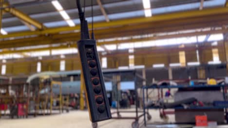 overhead crane remote on the middle of production line factory