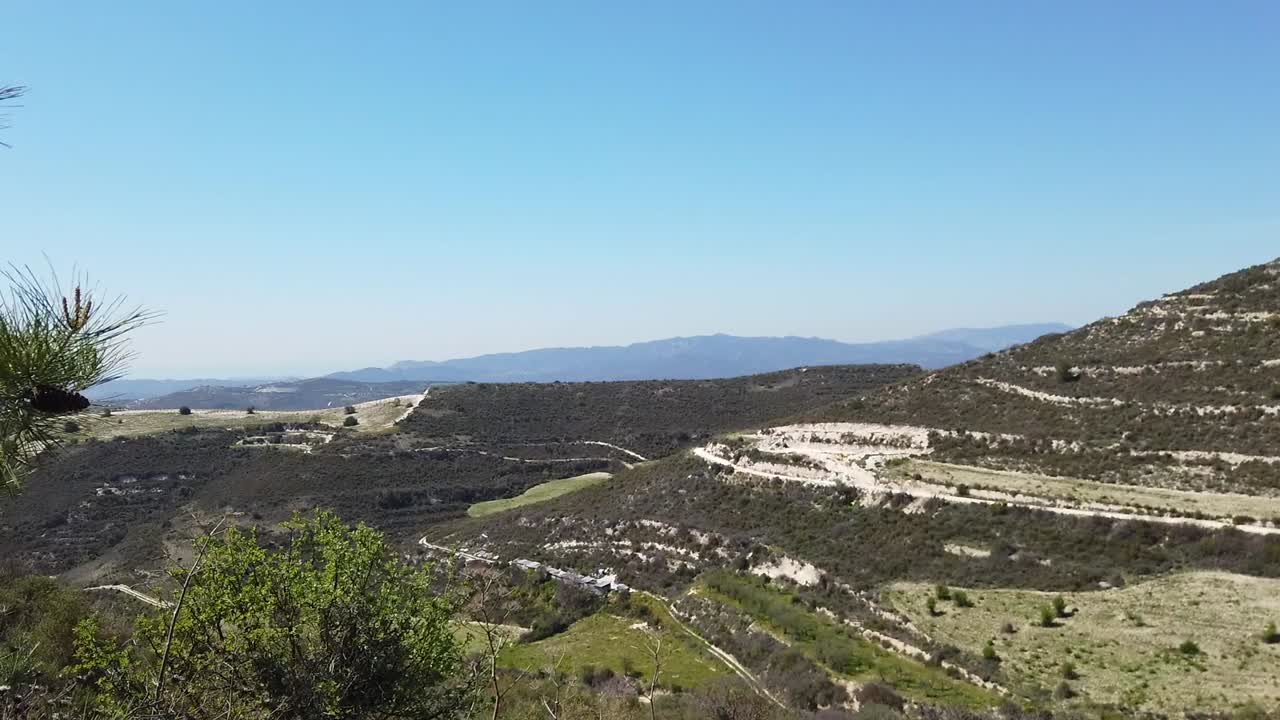 A stunning countryside landscape capturing the beauty of nature, rural life, and Mediterranean charm. A scenic countryside view Mediterranean beauty under clear blue skies.