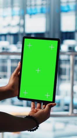 vertical video robotics technician using chroma key device in smart factory