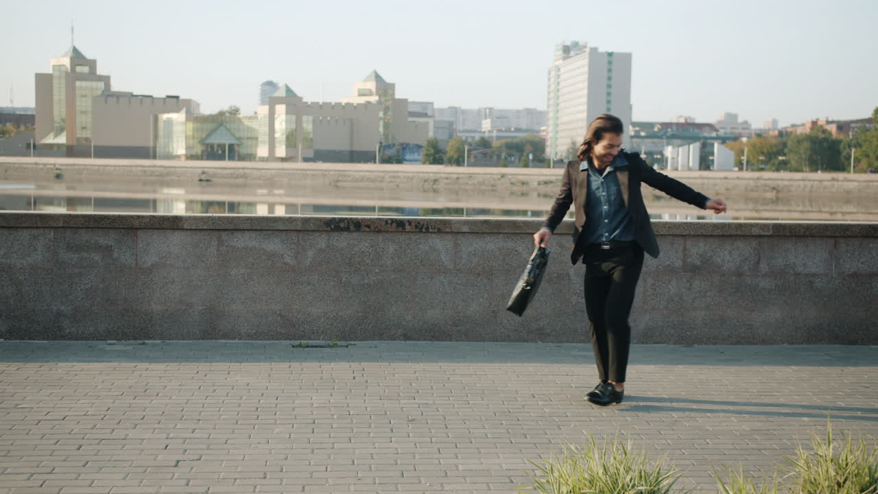 Happy Businessman Dancing Outdoors