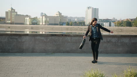happy businessman dancing outdoors
