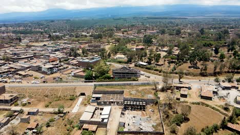 Birdseye-aerial-view-of-loitokitok-rural-village,-shanty-poor-neighborhood-of-Nairobi,-Kenya