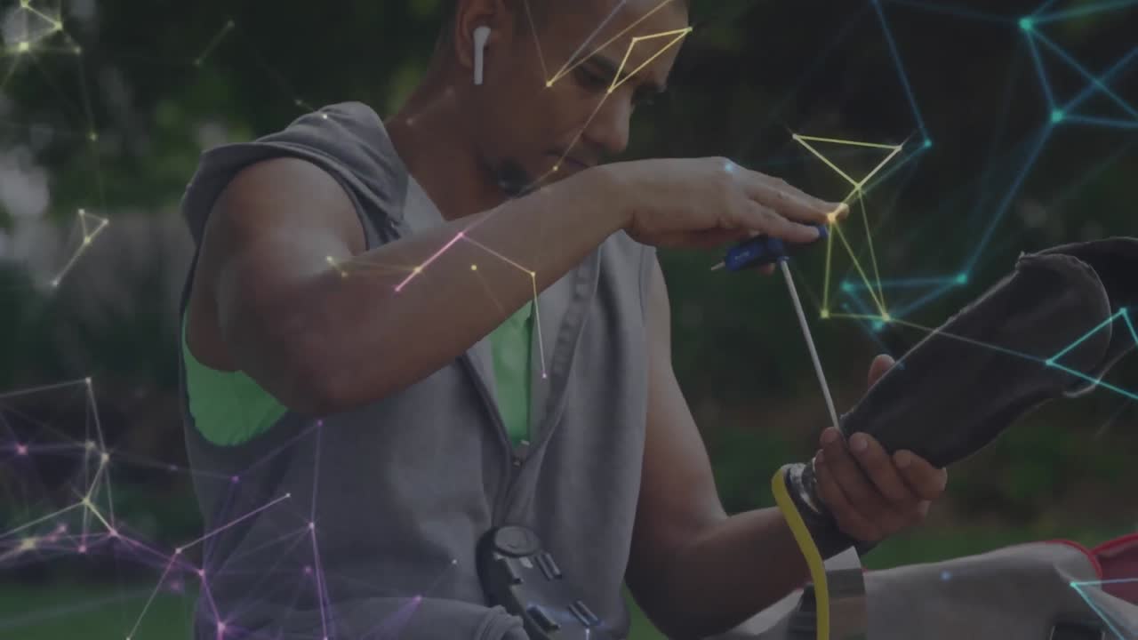 animación de la red de comunicación sobre el atleta masculino ajustando la pierna protésica para el ejercicio al aire libre