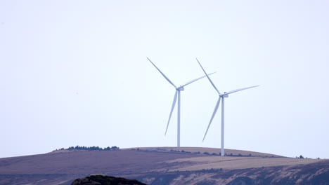 wind turbines on haramsfjellet, just outside the city of ålesund in norway