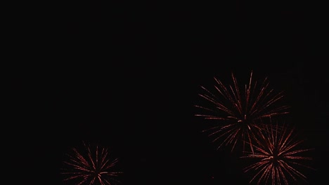 real fireworks exploding celebration frame fill and loop seamlessly abstract blur bokeh lights in the night sky with the glowing fireworks show festival