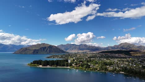 soaring drone footage over lake wanaka and the town on its shores