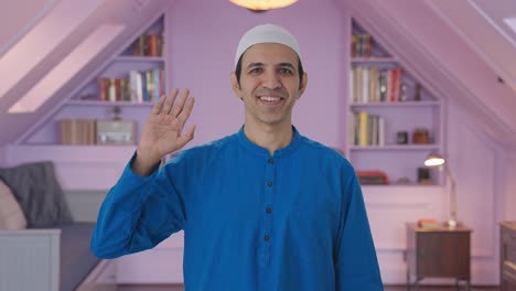 happy muslim man saying hello