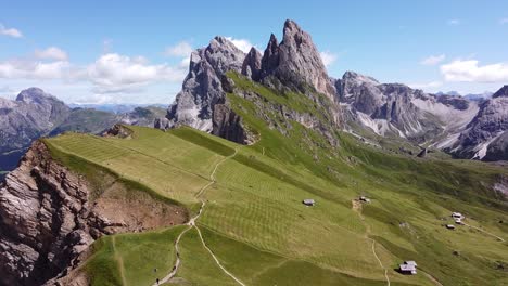 seceda mountain peak and val gardena valley at south tyrol, italian alps, dolomites, italy - aerial drone view