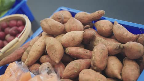 closeup shot of sweet potatoes in food shelfs in grocery store of minnesota, usa.