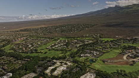 Wailea-Makena-Maui-Hawaii-Aerial-v8-high-altitude-captured-panoramic-views-of-golf-course,-oceanfront-resort-hotels-along-the-coastline-and-mountain-landscape---Shot-with-Mavic-3-Cine---December-2022