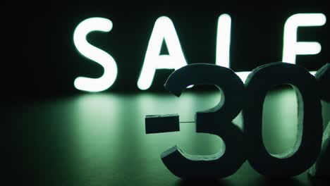 composition of neon sale text on black background