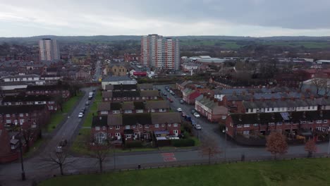 Aerial-above-Welsh-Flint-housing-estate-North-Wales-town-property-pan-left