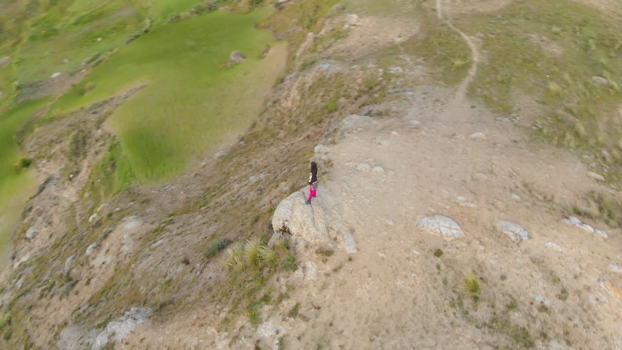 Male model in front of the andes, huaraz, peru, eagle view aerial shoot