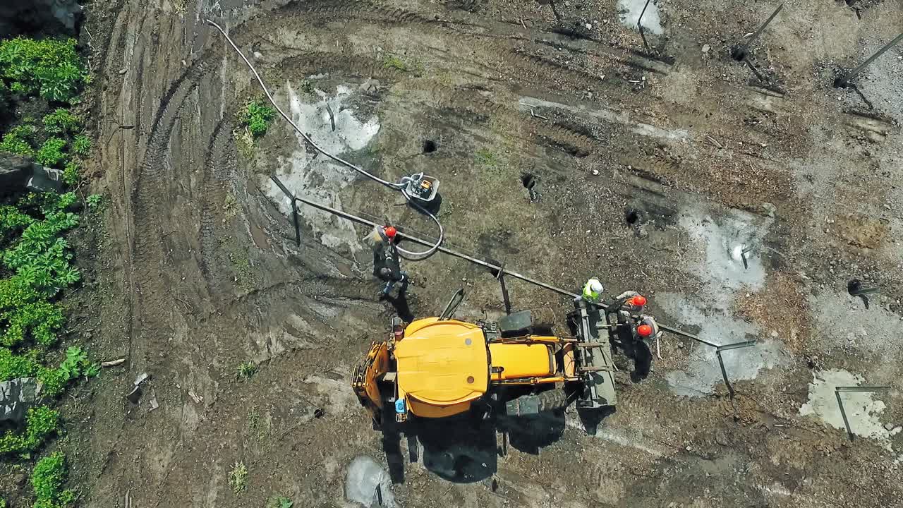 Machinery on construction site. Top down view of construction area with machinery