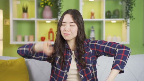 happy asian young woman dancing.