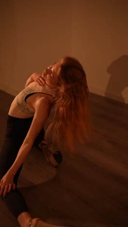 female dancer posing and stretching