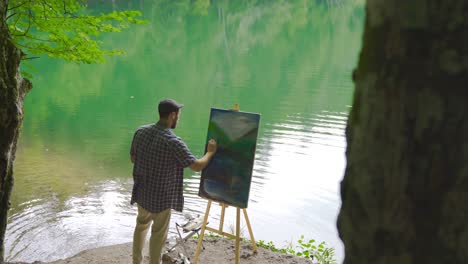 painter painting among trees.