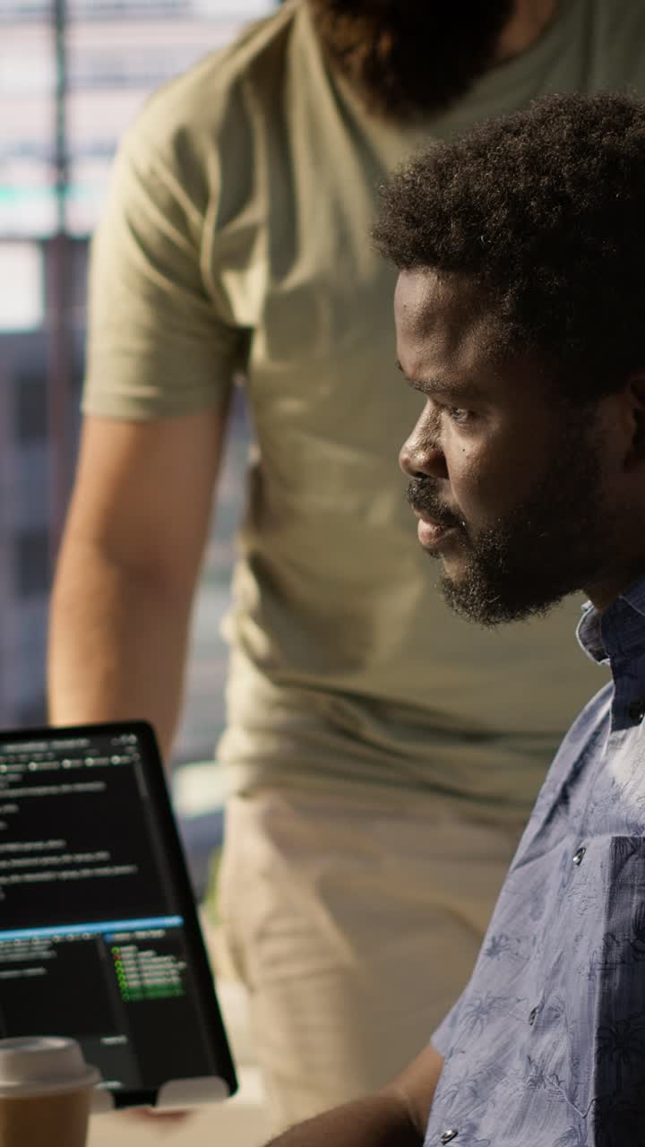 Vertical video Manager coming to check on progress done by programmer creating AI