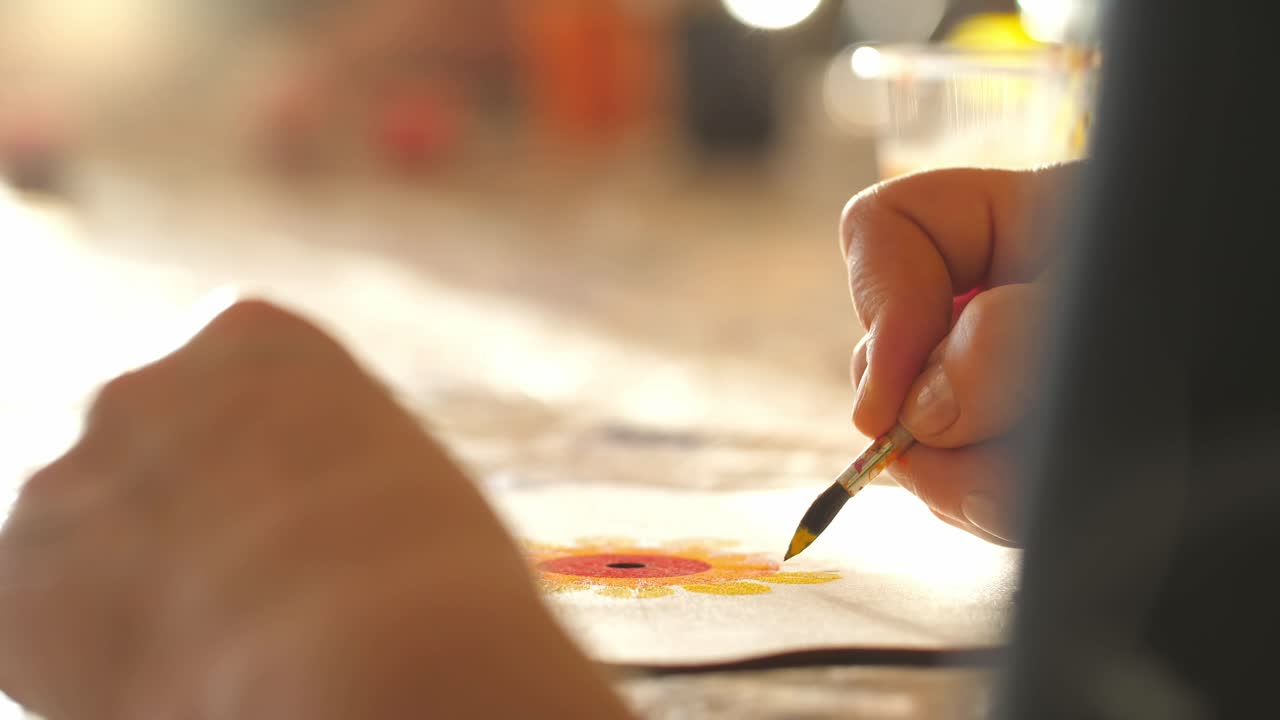 Child Painting a Sunflower
