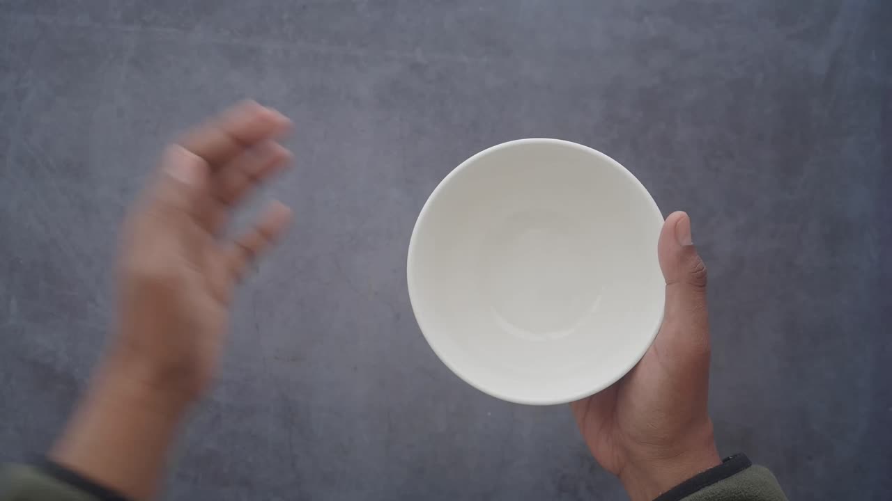 Empty bowl held in hands