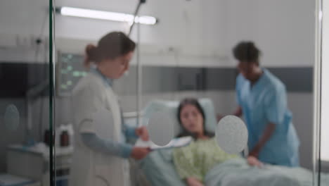 Sick-woman-resting-in-bed-with-oxygen-tube-explaining-disease-symptom