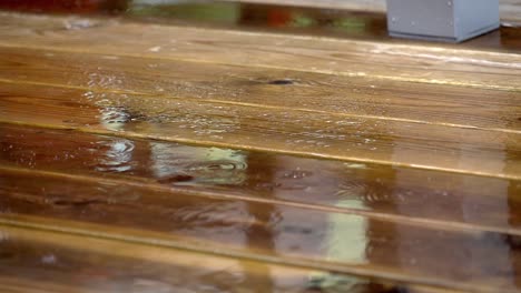 rain hitting decking made of wood