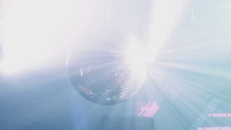 disco ball under spotlight